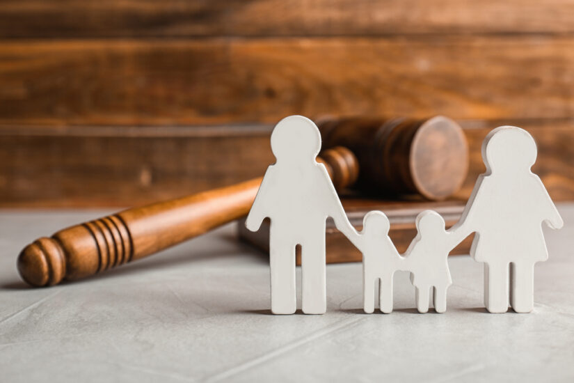 Family,Figure,And,Gavel,On,Table.,Family,Law,Concept